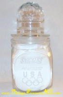 Image for Olympics 1992 Albertville, France Winter & Barcelona, Spain Summer Snickers Glass Candy Jar w/ Flaming Olympic Torch-design Lid <b><span style='color:red'>*****PRIORITY MAIL SHIPPING INCLUDED – DOMESTIC ORDERS ONLY!*****</span></b><span style='color:purple'>